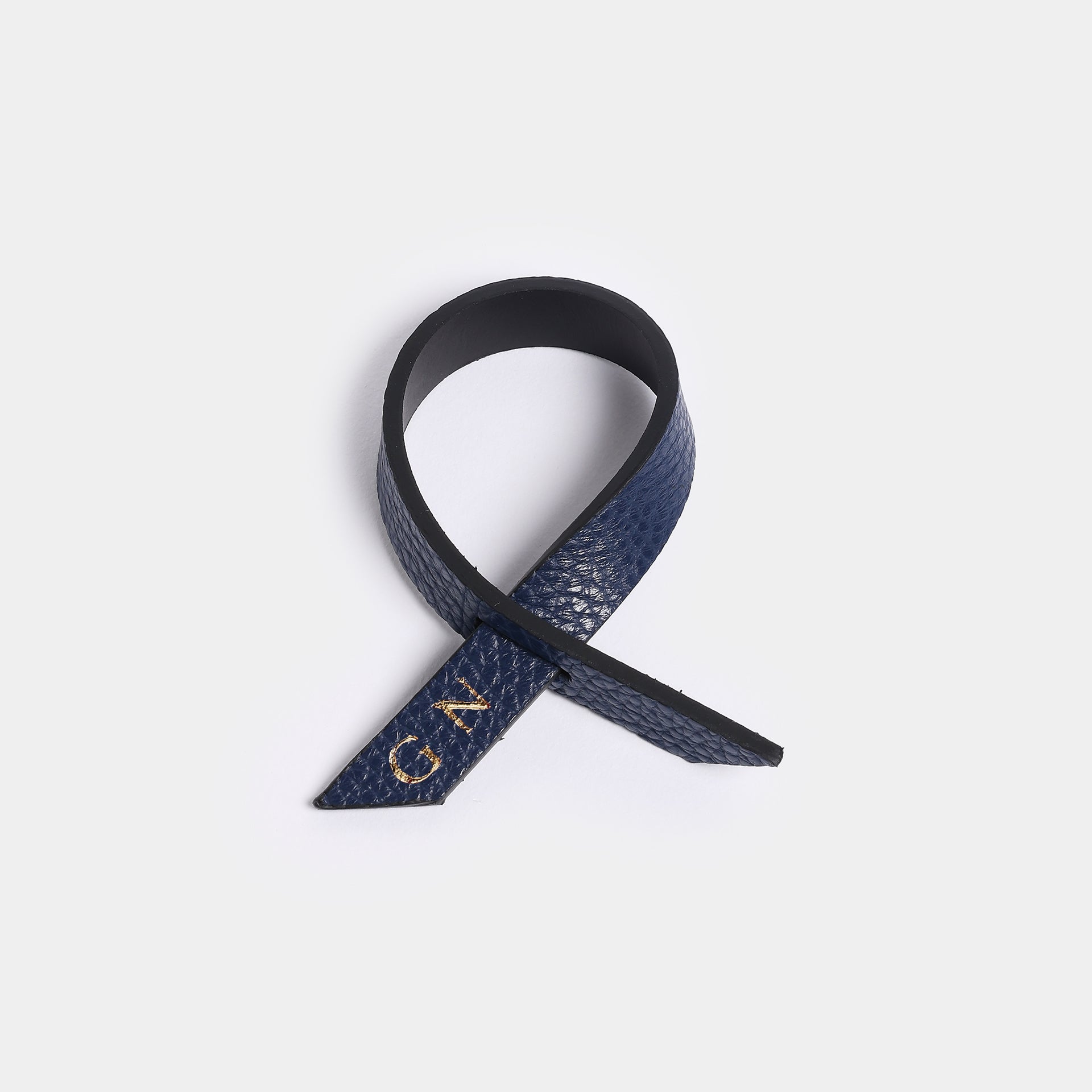 portatovaglio TILDE in pelle blu qualità artigianale arron design minimale personalizzato con iniziali