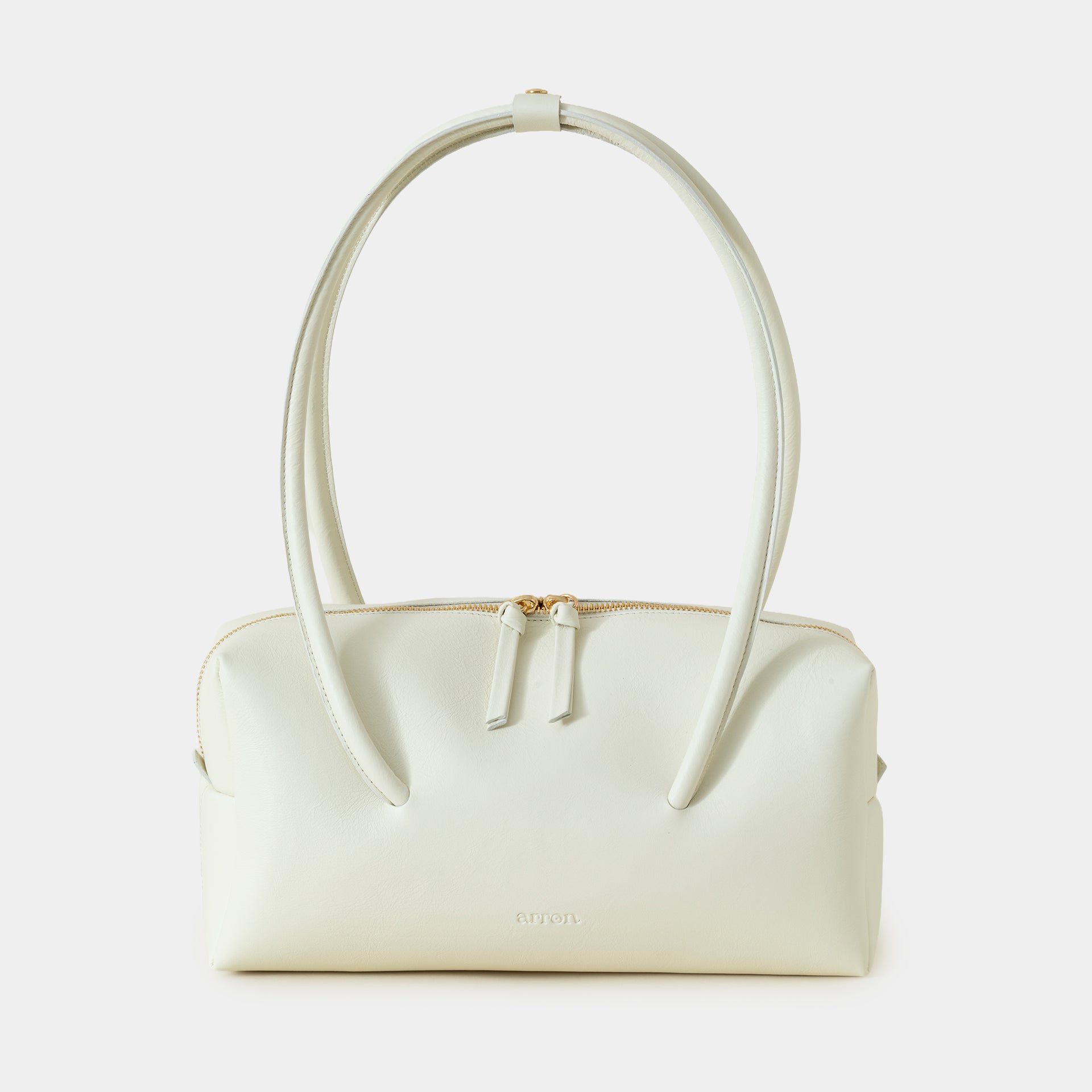 Carol borsa Made in Italy in pelle burro scultorea grafica modello east west con manico di design brand Arron vista frontale