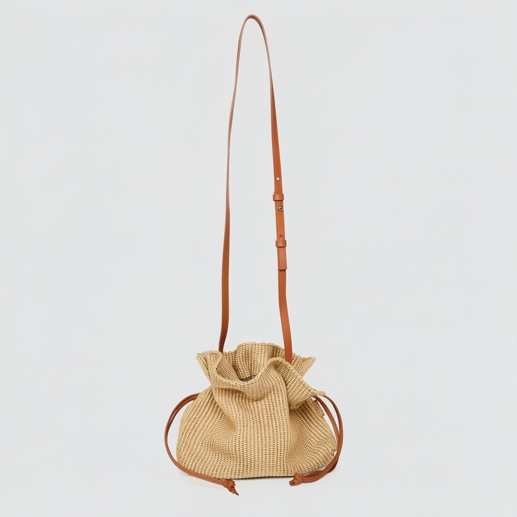 borsa Rossana a sacchetto in rafia ecrù naturale e pelle con tracolla e coulisse morbida quotidiana made in italy Arron